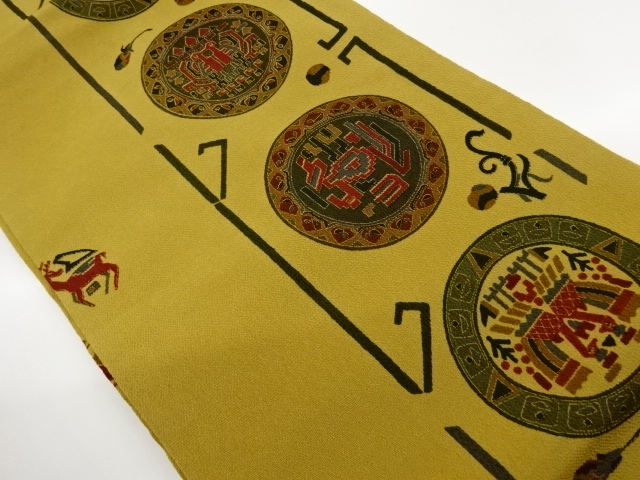 縮緬地丸文に向かい動物模様名古屋帯